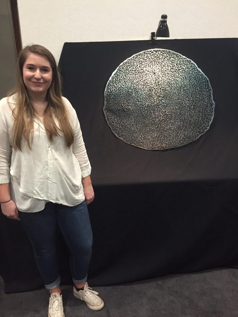 Katie Parkes with her work