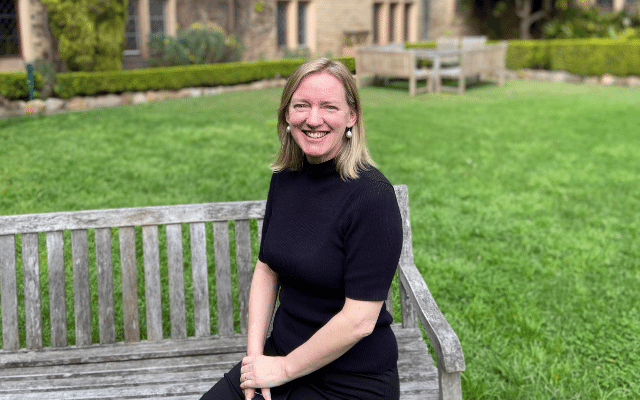 The College Principal sitting in the Quadrangle